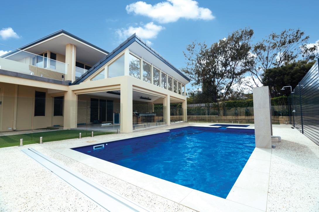 Pool surrounds featuring exposed concrete
