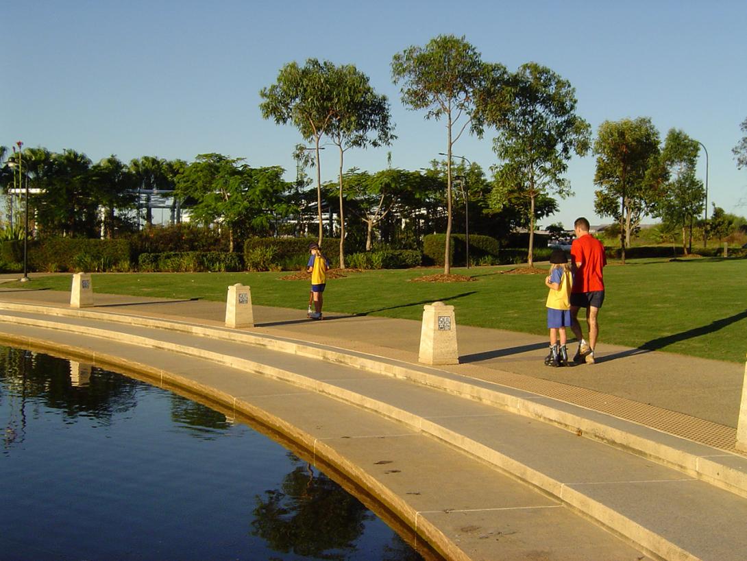 Concrete footpath by water