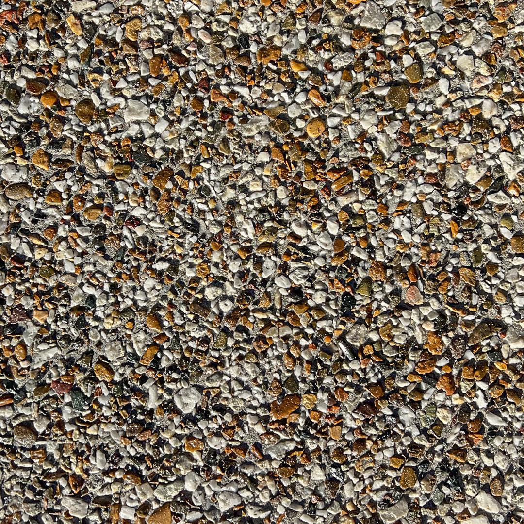Close up swatch of concrete with exposed aggregates in the shade Cherry Blossom