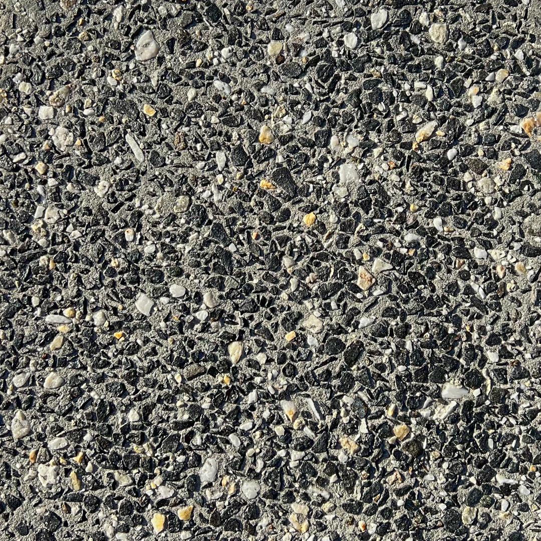Close up swatch of exposed aggregate concrete in mix Salt and Pepper