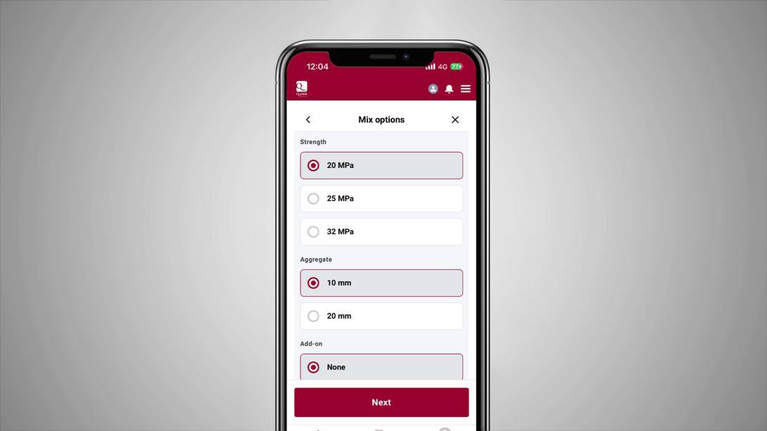 Closeup of phone screen showing order process on Q-crete app